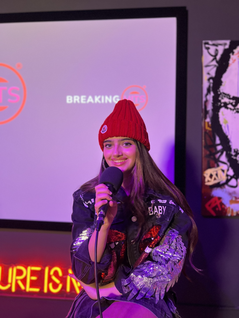 17-year-old Aria Mody wows with soulful covers of "Killing Me Softly" and "What Was I Made For" at BREAKING HITS, showcasing her talent as a singer, songwriter, and multi-instrumentalist.